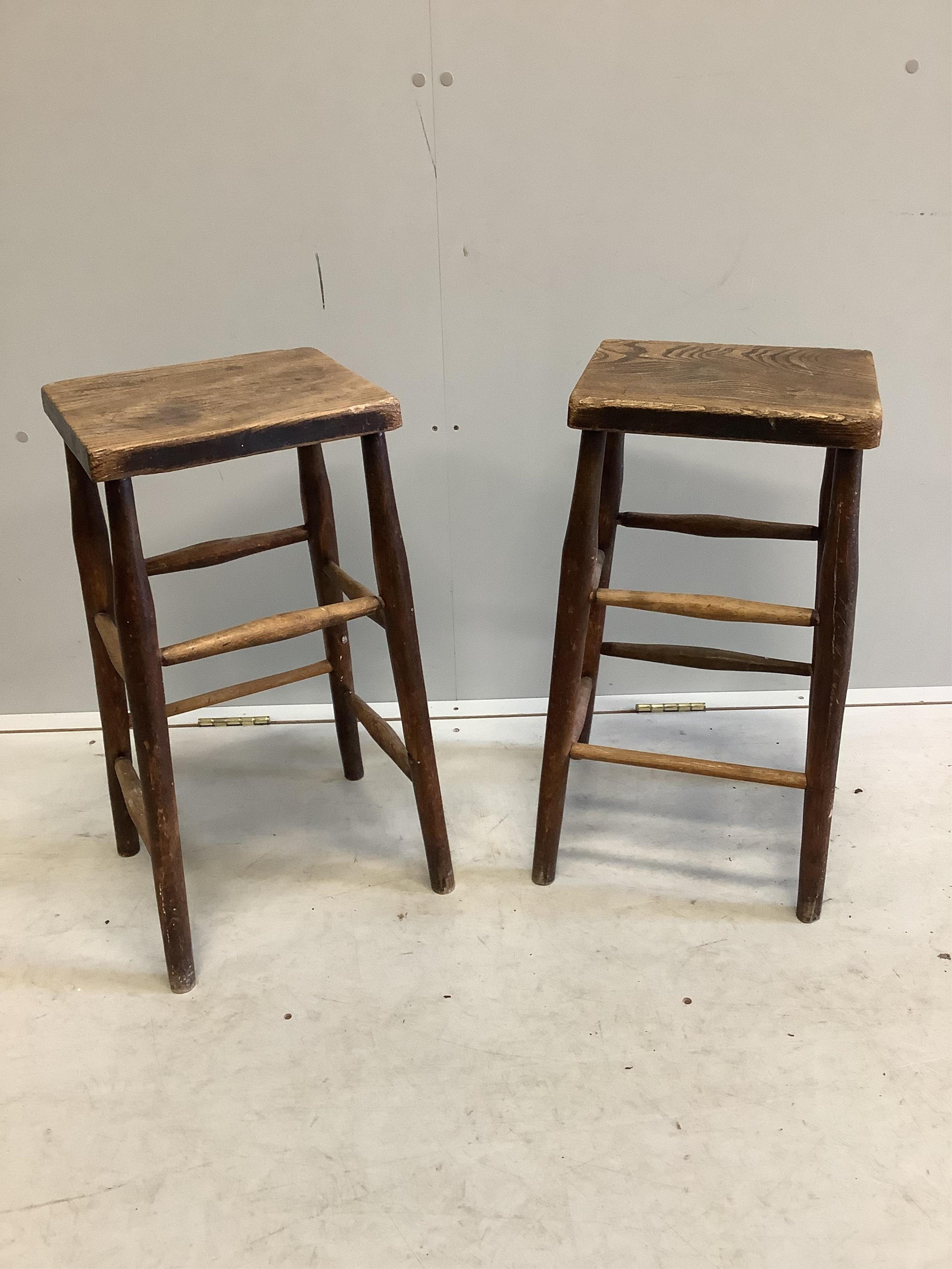 A pair of Victorian elm and beech stools, width 31cm, depth 25cm, height 62cm. Condition - poor, one stretcher missing